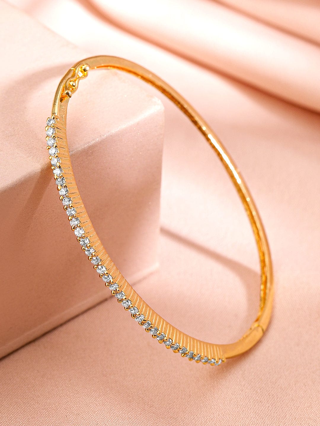 Wentra Women Brass Cubic Zirconia Handcrafted Gold-Plated Bangle-Style Bracelet