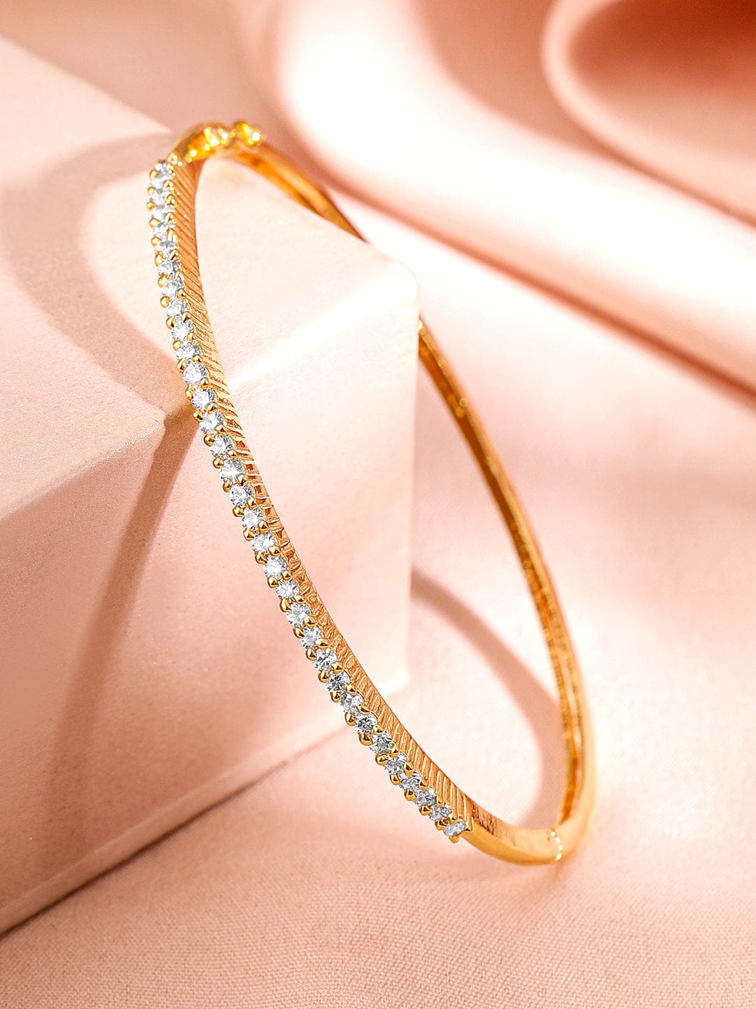 Wentra Women Brass Cubic Zirconia Handcrafted Gold-Plated Bangle-Style Bracelet
